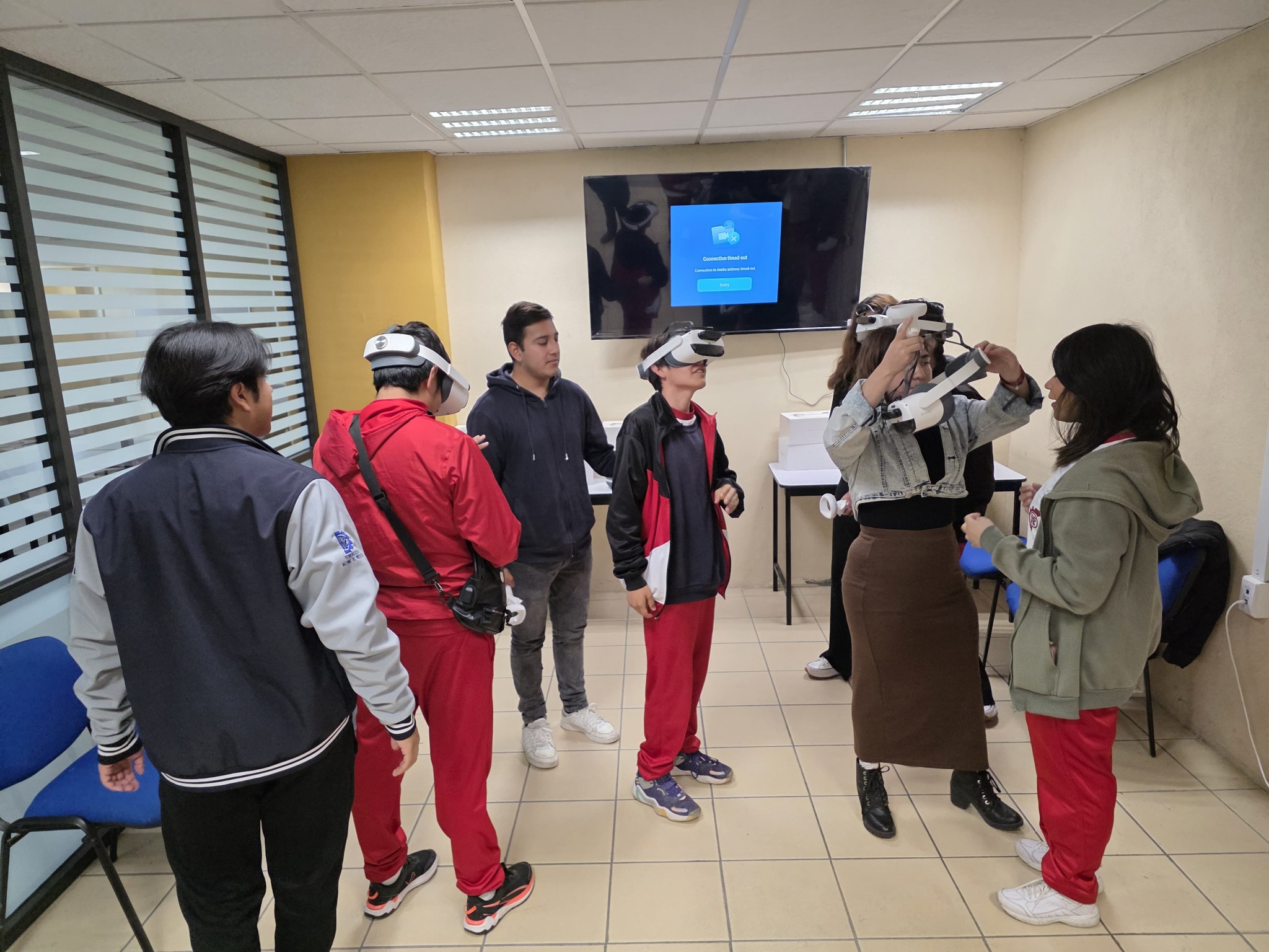 Students experiencing VR during a supervised session